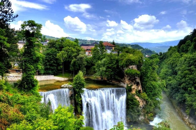 From Sarajevo: Travnik, Jajce, Pliva Lakes & Watermills Trip - Jajce Waterfall, a natural feature in an old town